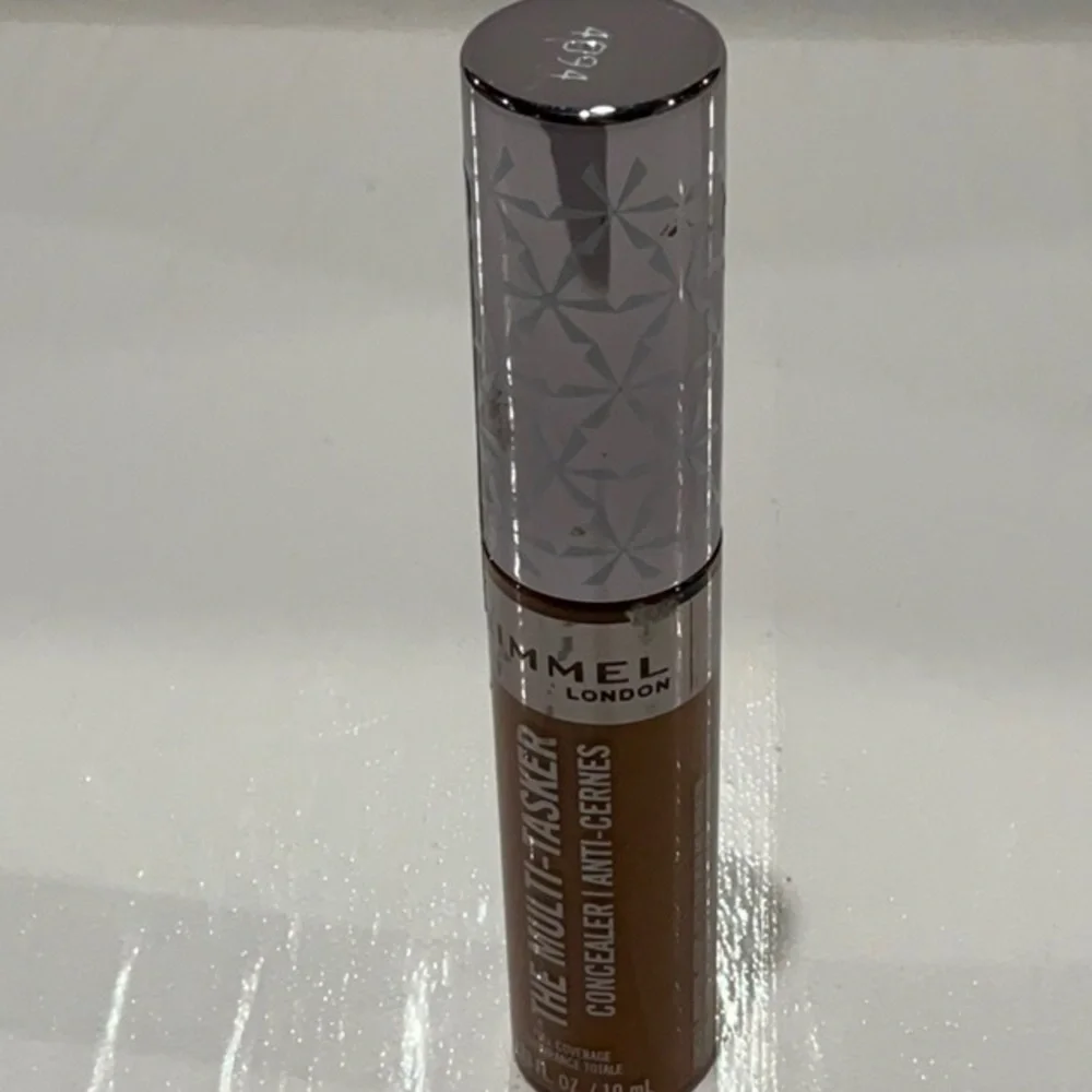 Rimmel London The Multi-Tasker Concealer. No. 100 Mocha